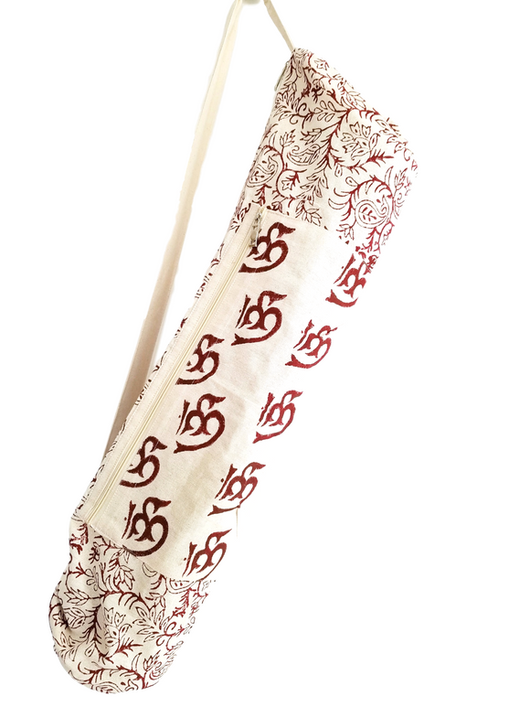 Handmade beige yoga mat bag with red floral patterns and text on a white background