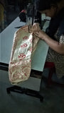 Woman crafting the Shakti Yoga Mat Bag — where compassion meets craftsmanship.