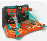 Toy basketball arcade game with multiple hoops and basketballs on a white background