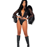 Model wearing a sexy black lace bodysuit costume with long sleeves and high boots.
