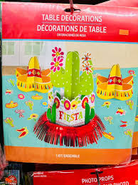 Table decorations with photo props on a red background