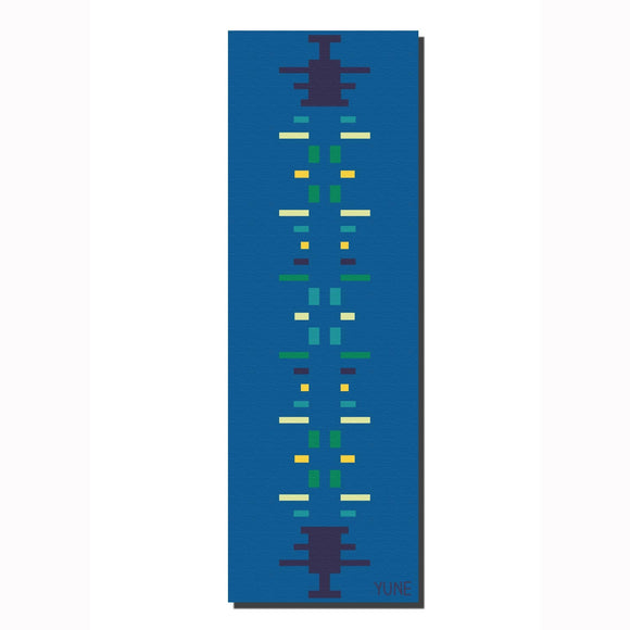 Yoga mat with pixelated design on a blue background