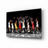 Basketball players in action with a black and white background